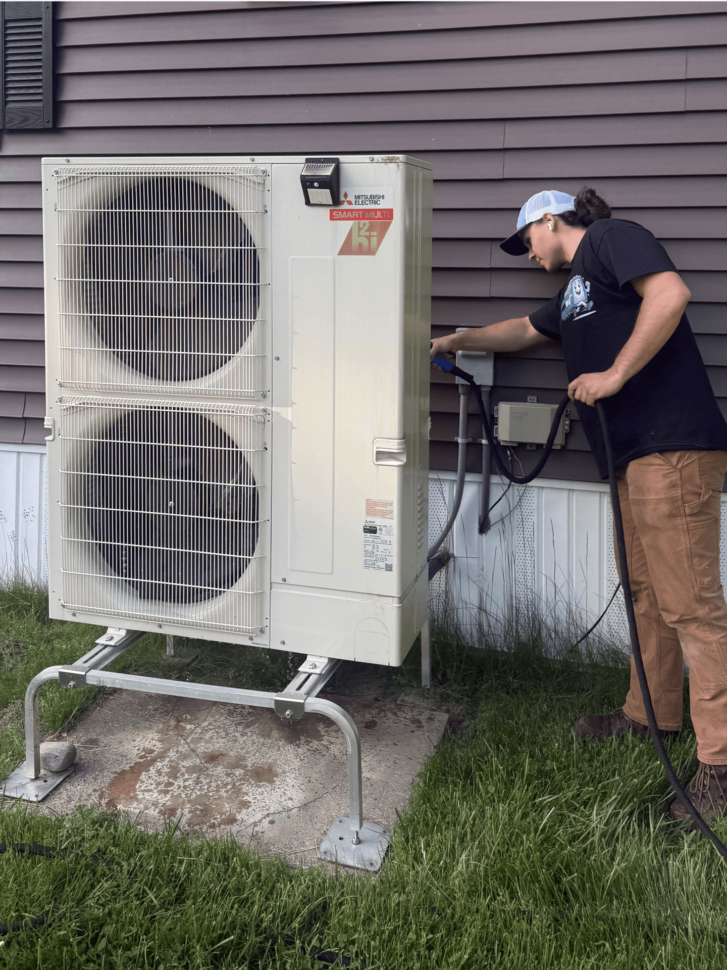 [Friend's Name] on an outdoor unit cleanup visit